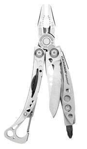 Silver Leatherman Skeletool multi-tool open with pliers and two blade tools