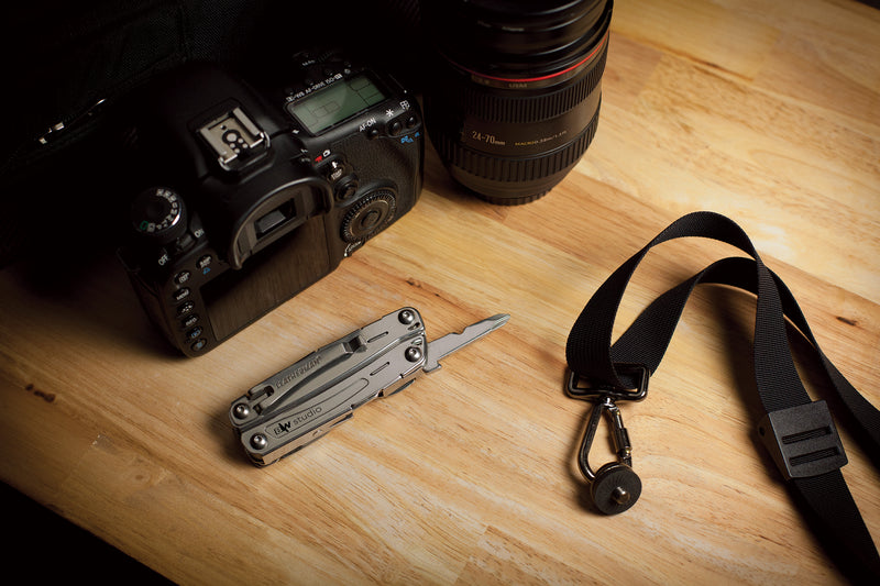Leatherman Sidekick multi-tool on tabletop with strap loop